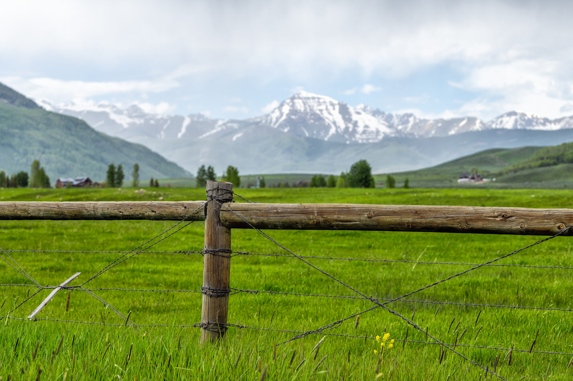 Colorado ranch land with mountains in the distance